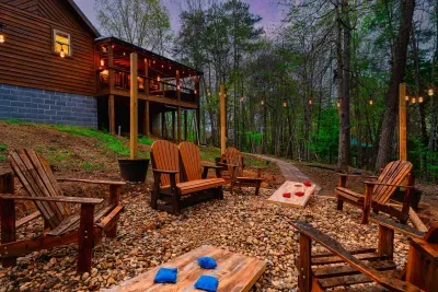 Beautiful conversation pit with ambient string lights! Perfect area for cornhole.