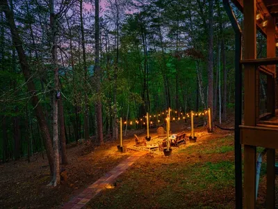 The paved path provides easy access to the backyard conversation pit.