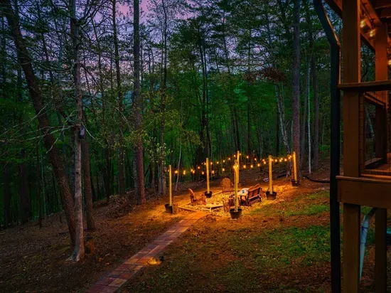 The paved path provides easy access to the backyard conversation pit.
