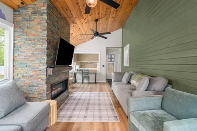 The main living room features a cozy gas fireplace, perfect for unwinding after a day outdoors.