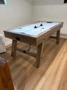 Fun game room with an air hockey table — perfect for friendly competition and family fun