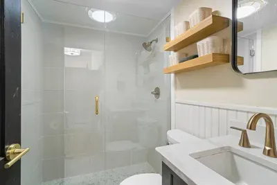 Bathroom with a standing shower