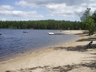 Spend the day at Moore's Pond, with private access to a large beach area, swim dock, mountain views. Great for kayaking, paddle board, fishing and swimming.