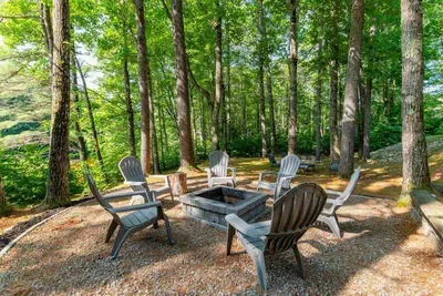 Cozy forest fire pit—perfect for s’mores and stories.