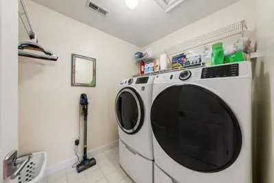Full laundry room to keep your stay comfortable and easy.