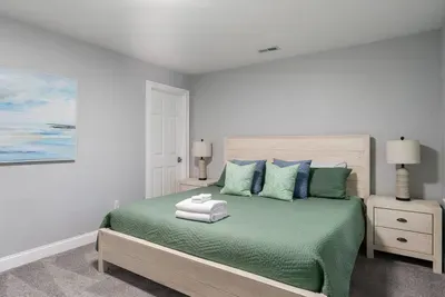 A king bedroom features plush comfort, soft lighting, and a peaceful atmosphere.