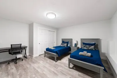 Cozy winter retreat with 2 comfy beds, a warm workspace with desk & chair—perfect for skiers, remote workers, families & couples. Stay close to winter trails, ski resorts & holiday attractions for a relaxing seasonal getaway.