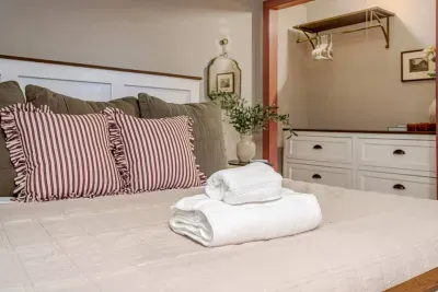 The extra comfortable King bed with high end linens wrap you up in comfort for a good nights rest. The black out curtains ensure you can sleep in.