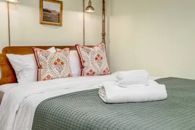 The queen bedroom is also on the first floor and is a cozy spot to sleep!