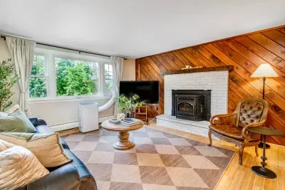 Our cozy living room offers comfortable seating, and air conditioning (Memorial Day-Labor Day) and a Pellet Stove (Oct 1- Memorial Day).