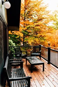 Deck area with outdoor chairs and grill area