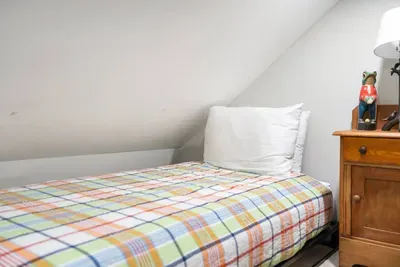 Loft bedroom with two twin beds.