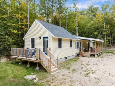 Front balcony and covered porch.