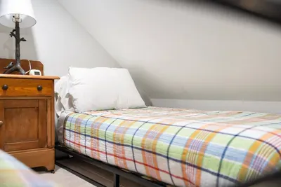 Loft bedroom with two twin beds.