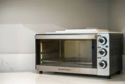 This is a Hamilton Beach toaster oven, perfect for quick baking, toasting, or reheating meals.