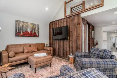 Cozy living room, comfy seating, and a smart TV