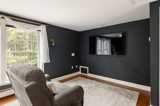 King bed with couch and TV area