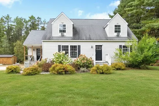 Inviting home with a beautiful, open yard.