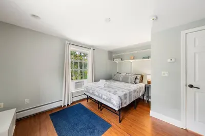 Clean, airy bedroom with peaceful vibes.