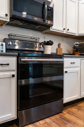 Guest-ready kitchen with modern appliances.