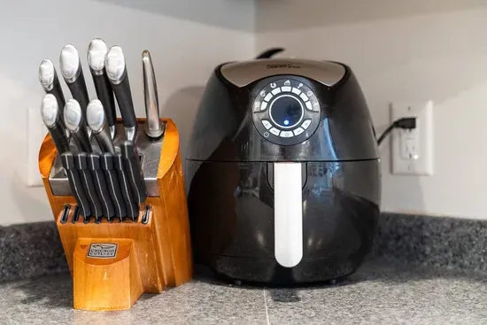 Air fryer and full knife set for easy meal prep.