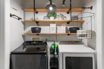 Convenient, tidy laundry area for your stay.