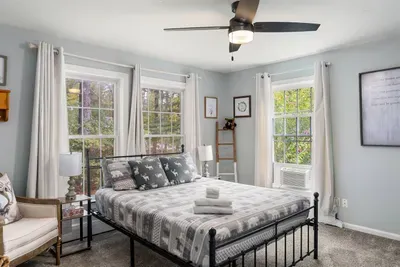 Comfortable bedroom with serene vibes.