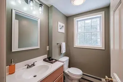 Half Bath (Main Floor): Conveniently located near the living space