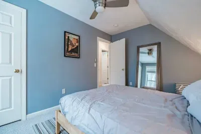 Primary Bedroom: Queen bed, AC unit, large closet