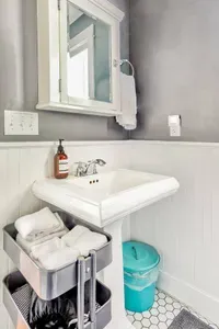 Our luxury bathroom features a rainhead shower, premium shampoo, and spa-quality towels—essential for any romantic coastal retreat