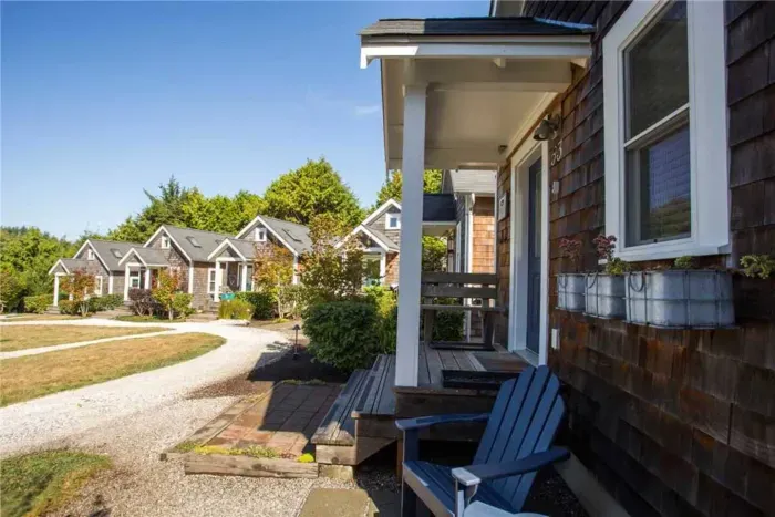 Enjoy morning coffee and the sounds of the ocean from your Adirondack chairs in Seabrook, WA.