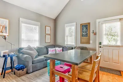 Sectional seating and a Smart TV make this a great hub for a weekend retreat.