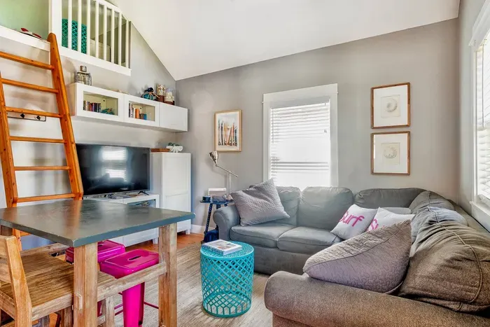 Cozy living area with a 55-inch Smart TV—ideal for family movie nights in Seabrook.