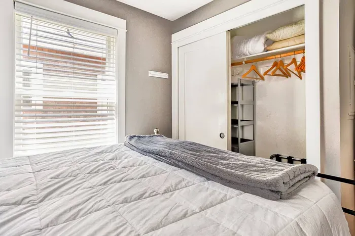 Ample storage closet in the primary bedroom, perfect for organized weekend getaways or longer family vacations.