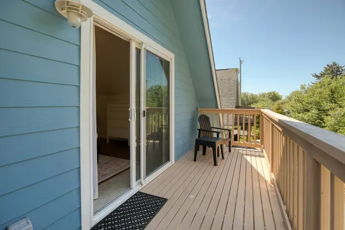Step out onto the private upper balcony to enjoy your morning coffee and listen to the ocean waves
