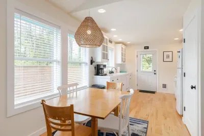 A light-filled dining area for you to enjoy meals and games with the family. We have a fully stocked board games closet for you to try