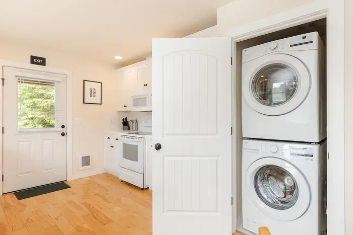 A full-size washer and dryer stack—essential for cleaning up after a fun day of clamming or beachcombing on the Washington coast.