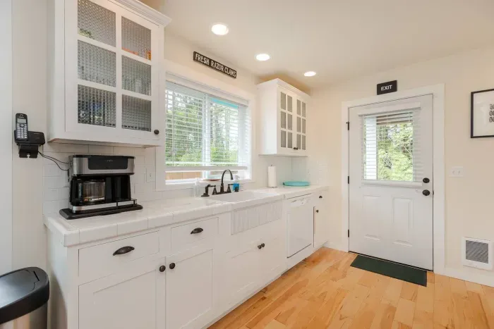A fully stocked kitchen featuring both K-Cup and drip coffee options. Everything you need to prepare family meals during your Washington coast weekend stay..