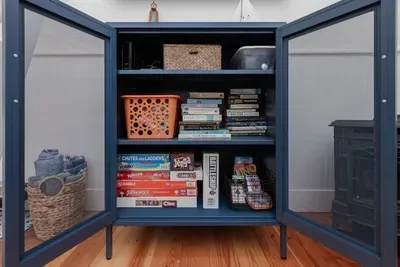 Fully stocked games closet as well as a number of books to read and enjoy