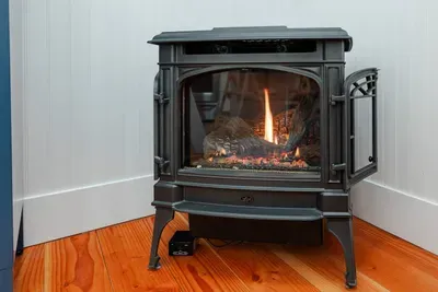 Gas fireplace that works at the touch of a button via remote. Great for cozying up on those rainy days!