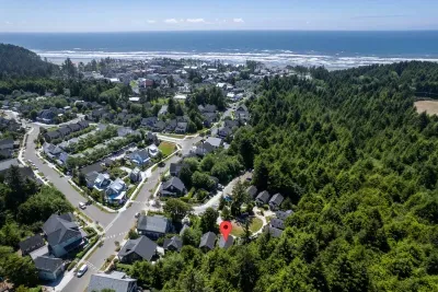 Slack Tide backs up to the trees creating a wooded escape but close to the beach