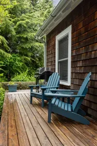 Enjoy coffee and the sounds of the ocean from your private deck. 4 burner gas grill available for use.