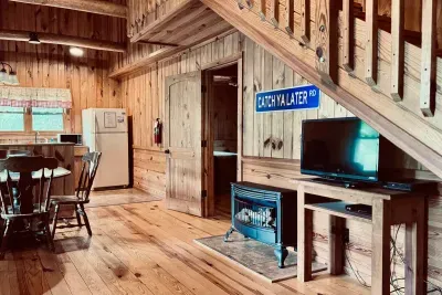 View from living area into dining area and kitchen.
