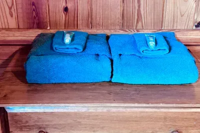 Fresh towels and body gel on the dresser in each bedroom