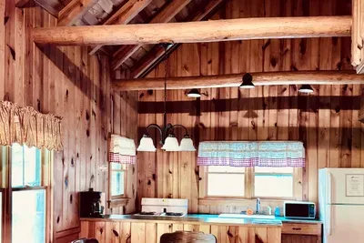View of ceiling rafters over kitchen and dining area
