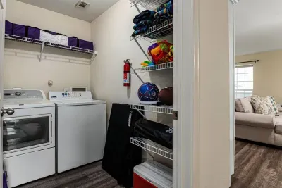 Who wants to bring wet clothes home? Wash and dry 'em here. (This is also where we keep most of our outdoor games.)