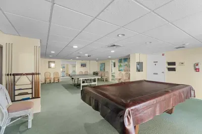 Full size pool table in the family room area