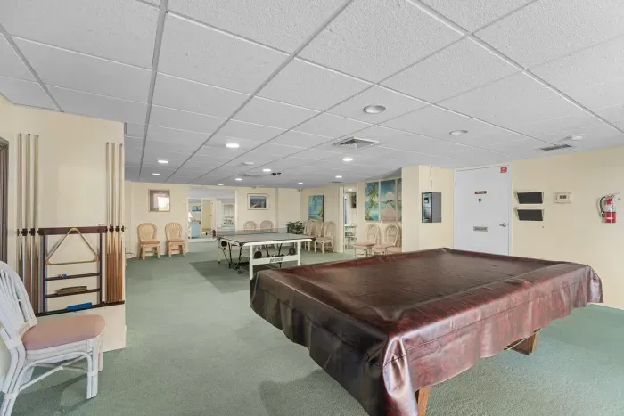 Full size pool table in the family room area