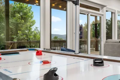 Unleash your competitive side in the lower-level game room! #GameOn