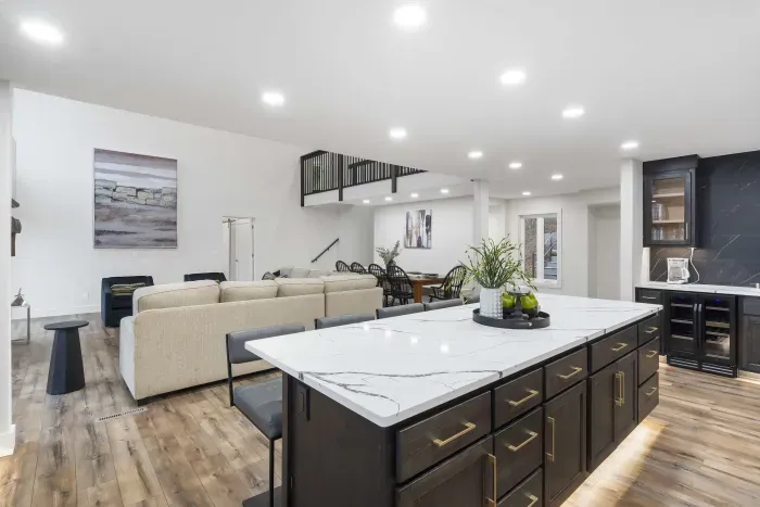 The chic, open kitchen offers ample space & every home comfort
